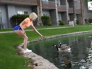 Outdoors Movie Of Solo Blondie Kiara Feeding The Ducks In The Pond